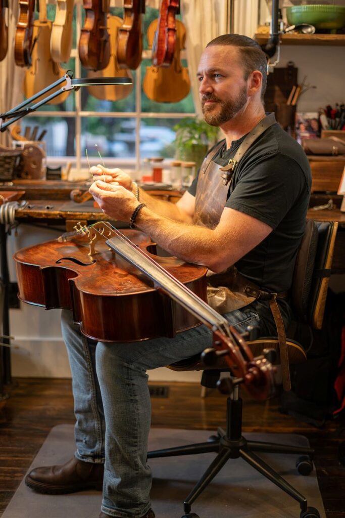 St George Luthier repairing cello