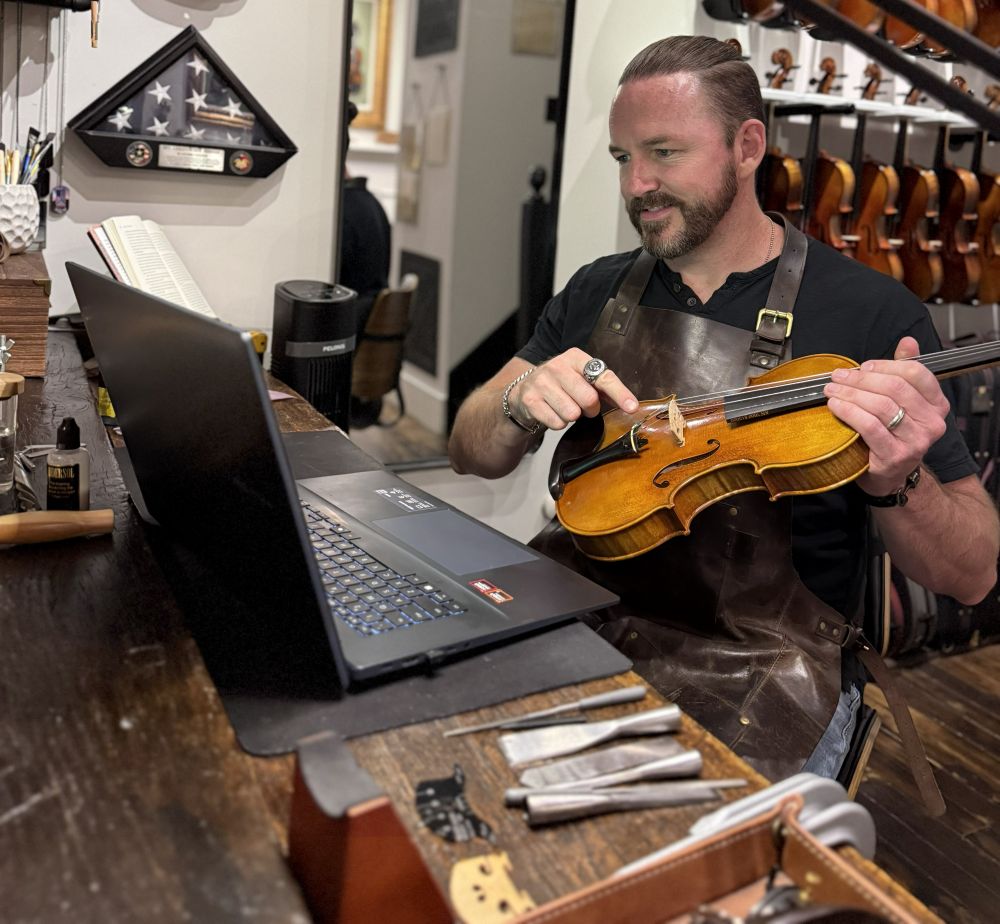 Violin Gallery Luthier Showing Violin Quality in an Online Shopping Appointment