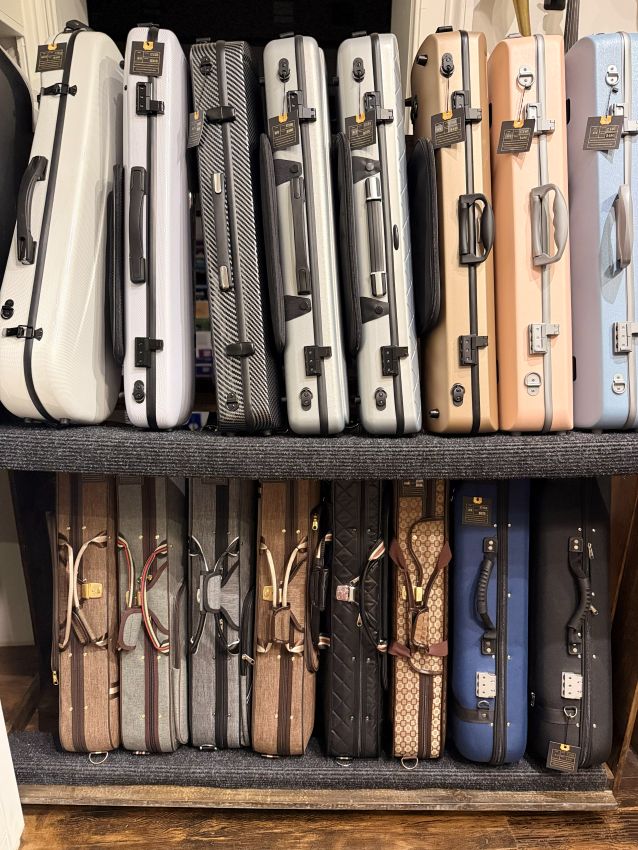 A selection of violin cases in St George Utah retail shop.