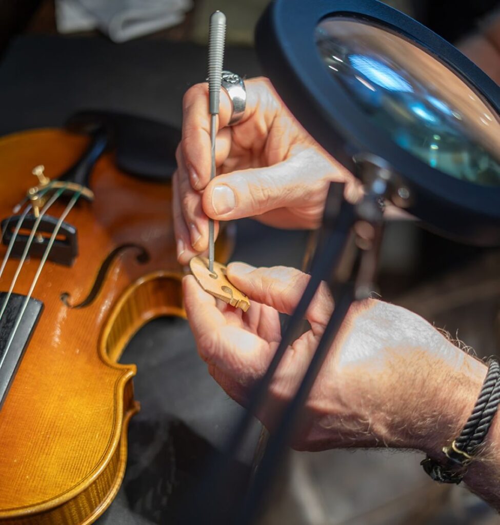 Southern Utah Luthier Repairing Violin Bridge