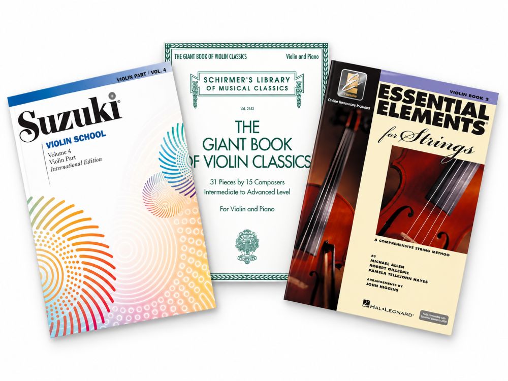 Selection of violin sheet music method books